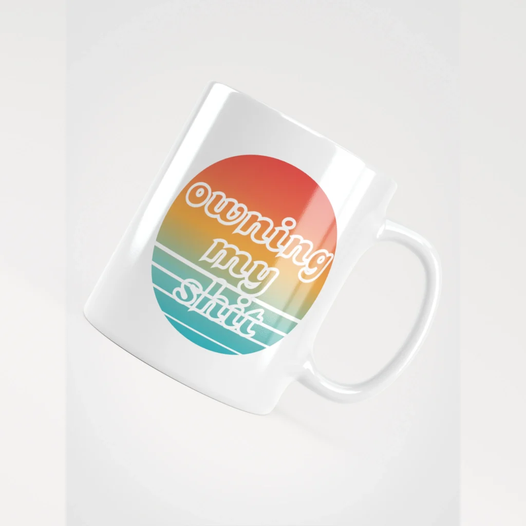 Owning My Shit white mug with multicolored graphic