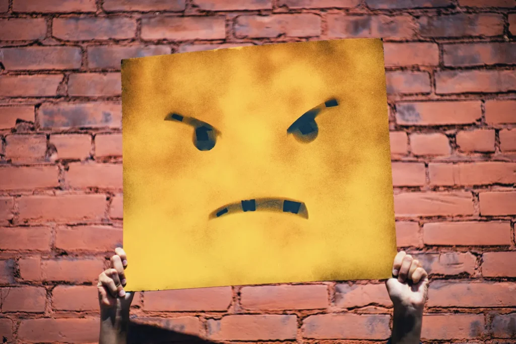 Abusive Customers image med image by Andre Hunter yellow frowning face sign